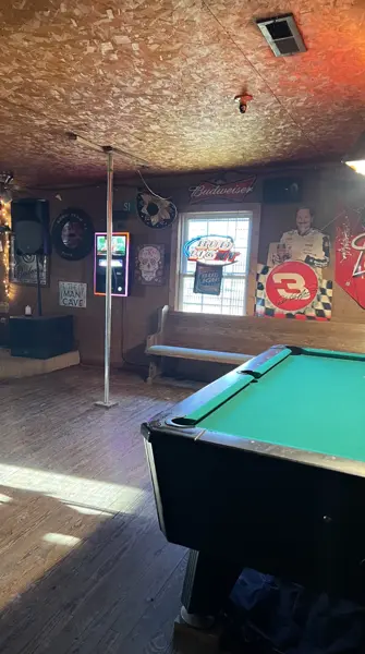 Pool table under the decorated ceiling