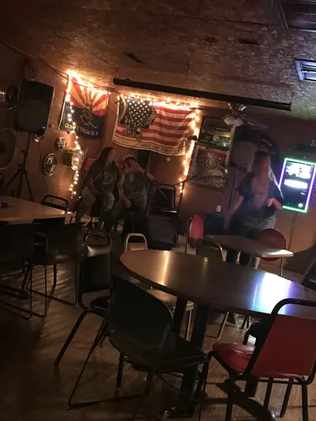 Tables, flags and neon inside